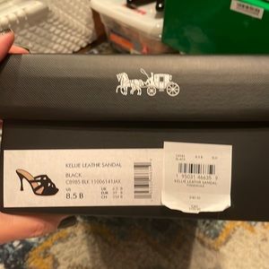 Brand new never been worn coach heels.
